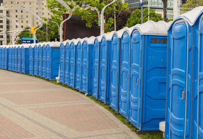 a row of portable restrooms at a fairground, offering visitors a clean and hassle-free experience in copell